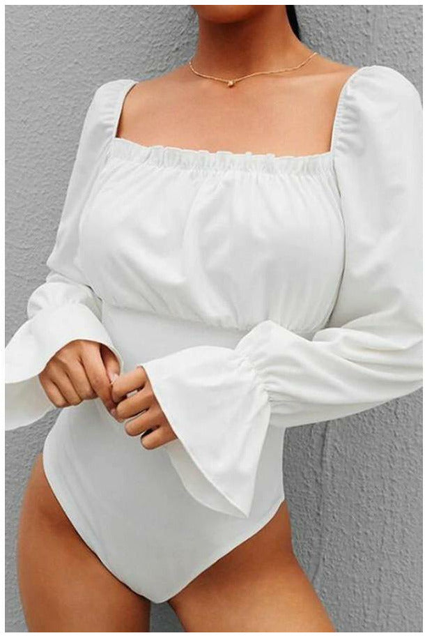 white body suit, ties in back